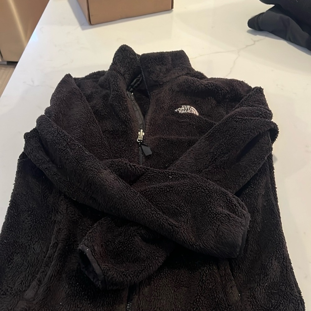 Fuzzy North Face small. Good condition.
